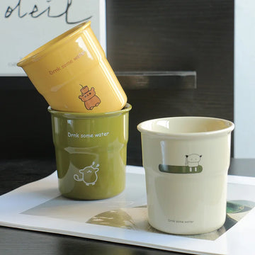 Ins style simple and cute cream style casual ceramic coffee cup, water cup, milk cup, breakfast cup, hand-held cup, cartoon cup